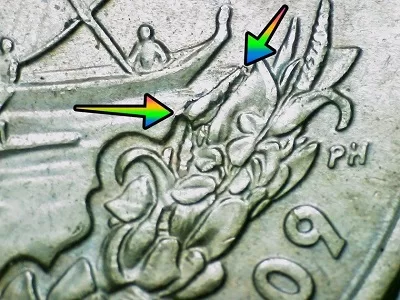 2009 Northern Mariana Islands State Quarter reverse up close image with arrow noting the die break at the front of the boat