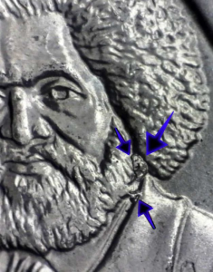 frederick douglass quarter error image showing a die break on the beard