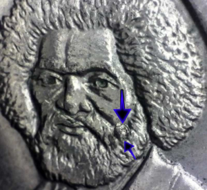 Microscope image of 2017 frederick douglass quarter beard error