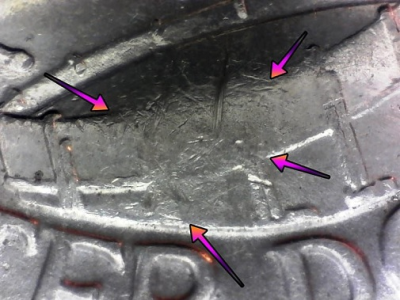 microscopic image a common bicentennial quarter error displaying in the center of the drum on the drummer boy quarter dollar coin