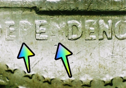 microscopic image of errors on a kennedy half dollar coin