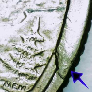 microscopic image showing a cud error up close on the reverse of a colorado state quarter
