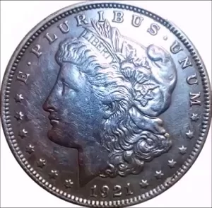 Macro image of the obverse of a rare wide reeded rim 1921 silver morgan dollar variety coin