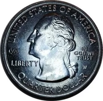 macro image of the obverse of a 2020 salt river bay west point quarter featuring the v75 privy mark