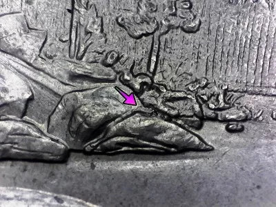 microscopic image of a 2018 Minnesota Voyageurs quarter doubled die reverse