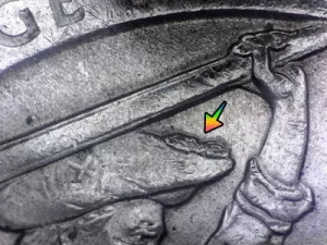 microscopic image of an arrow noting a die break error on a 2017 Indiana quarter