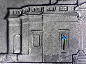 microscopic image of arrows noting errors on a 2019 D Jefferson nickel error coin