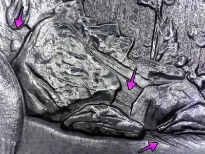 microscopic image showing feeder finger die scrapes on a 2018 quarter